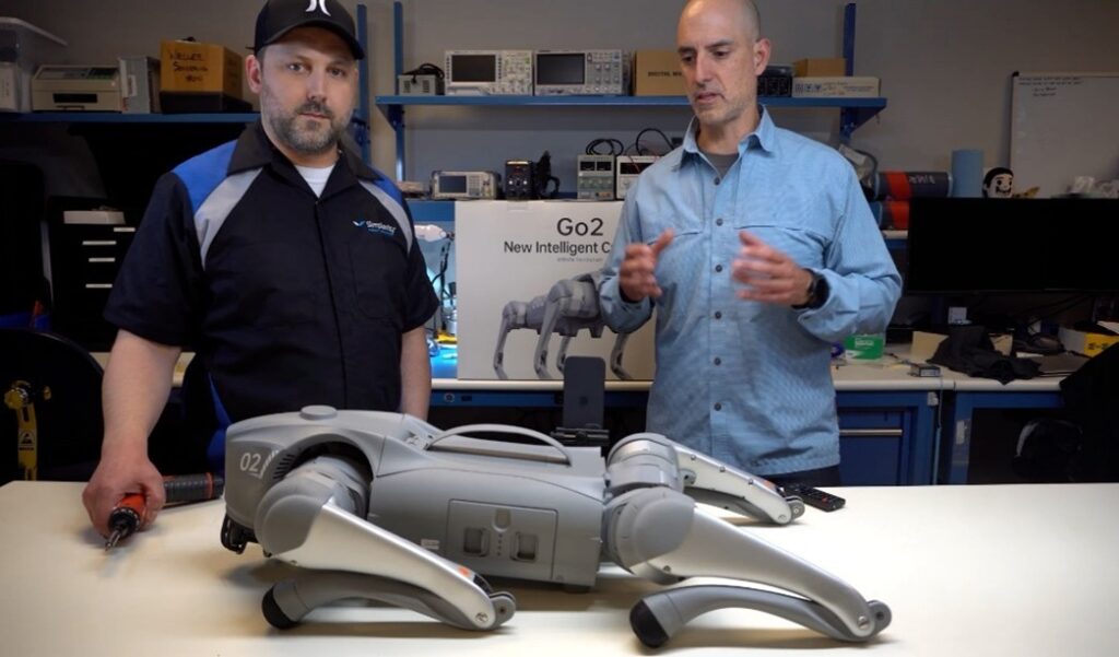 Simplexity Senior Mechanical Engineer, Luis Elenes and Technician/Machinist, Jason Glaser reverse-engineering the UniTree Go2 Quadruped Robot Dog
